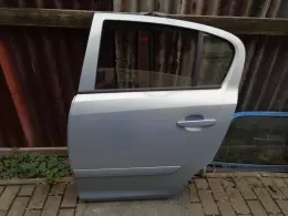 Opel corsa D levé zadní dveře  